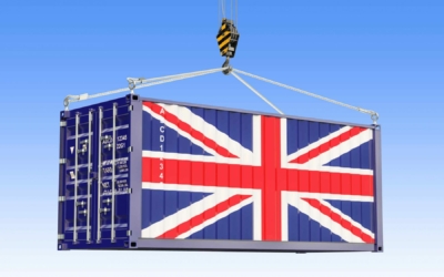 Cargo container with British flag hanging on the crane hook against blue sky, 3d rendering